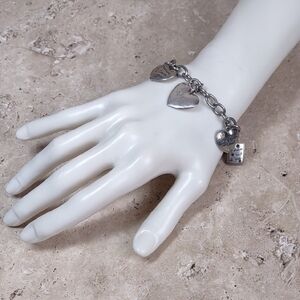 Juicy Couture "Celebrate Life" Silvertone Heart Charm Bracelet